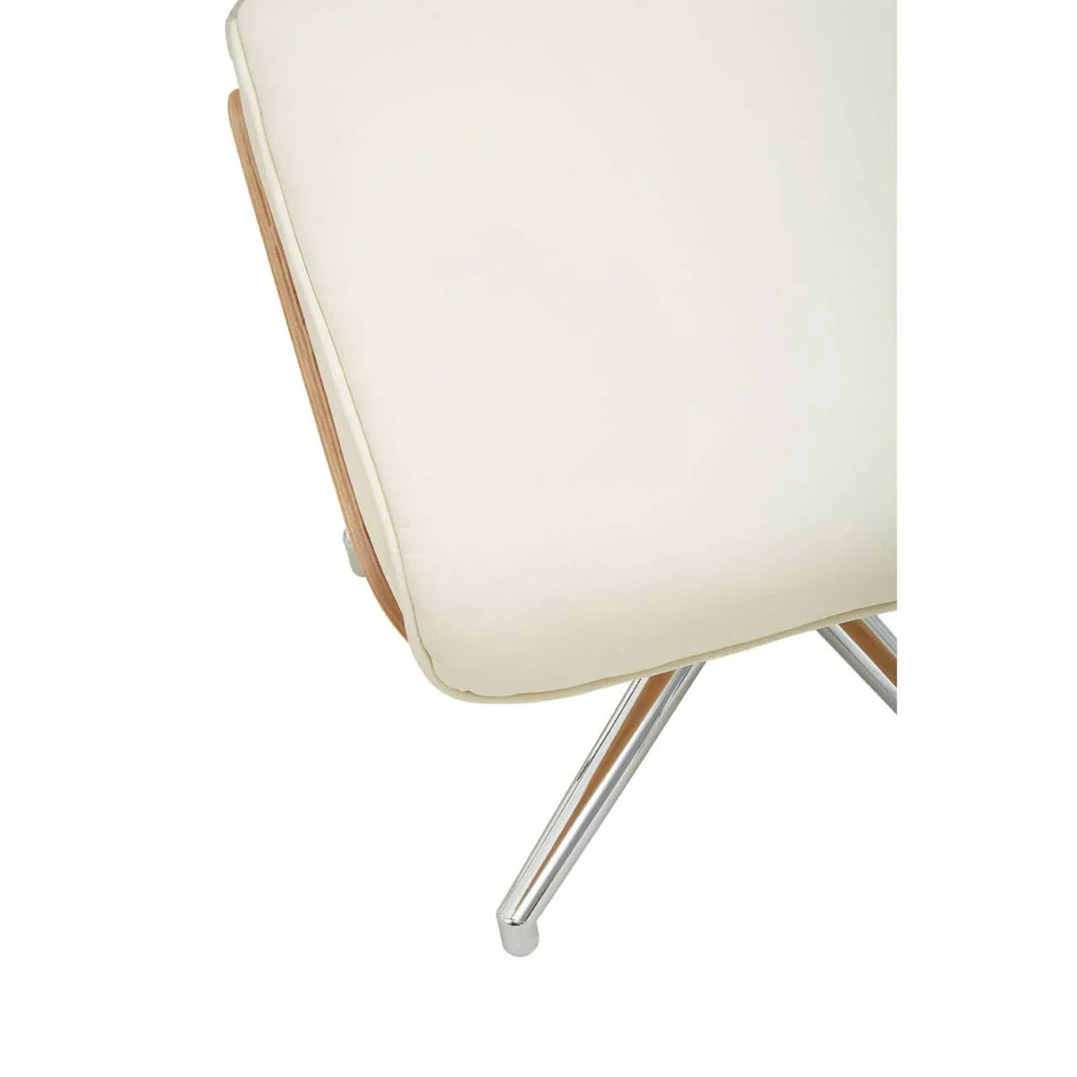 Closeup of cream cushioned chair seat with chrome angled legs and wooden trim