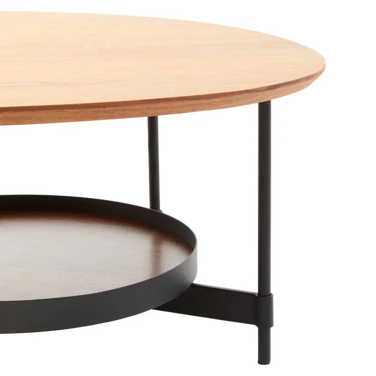 Round wood coffee table with black metal frame and lower storage shelf, side angle view