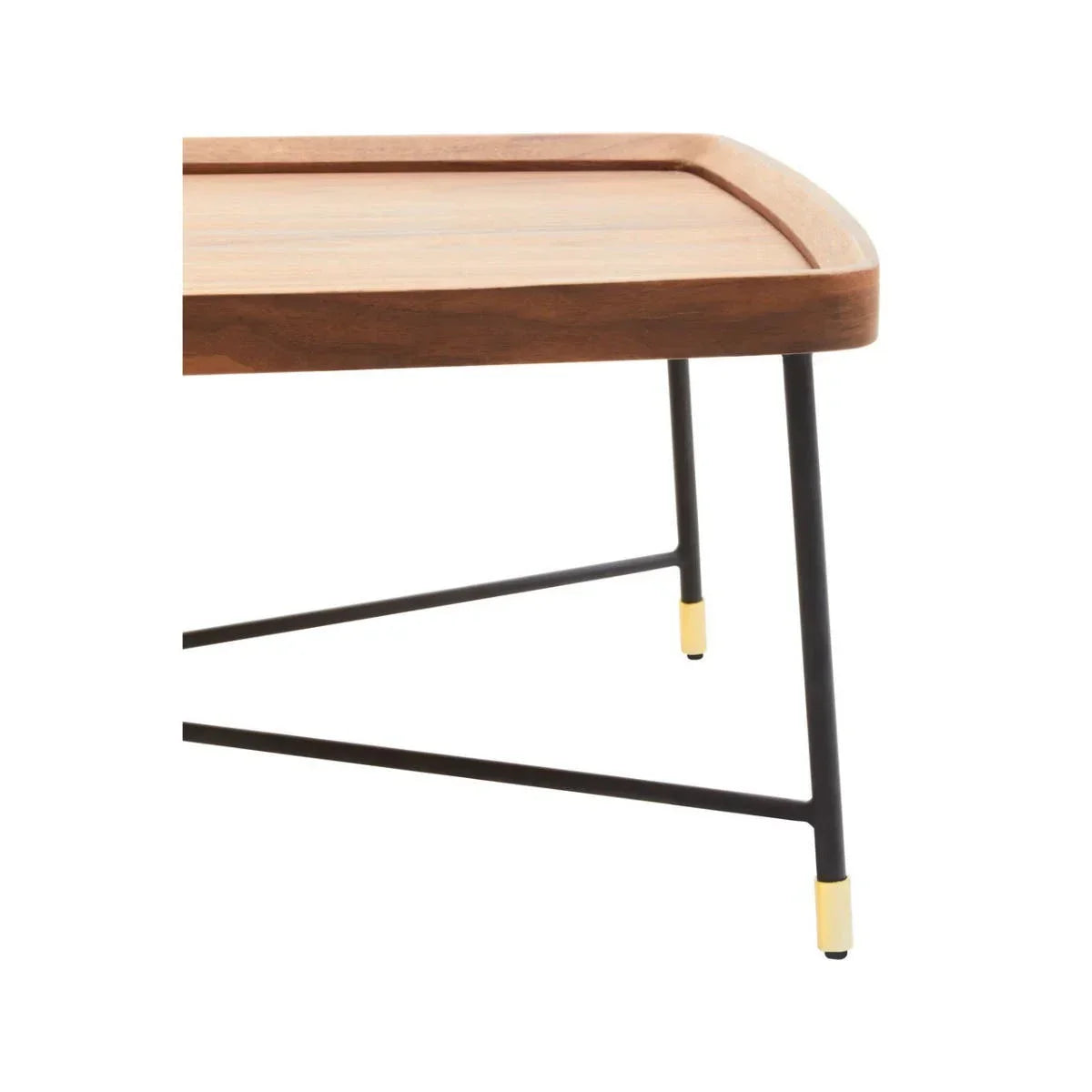 Walnut finish coffee table with black metal legs and brass tips, close-up corner view