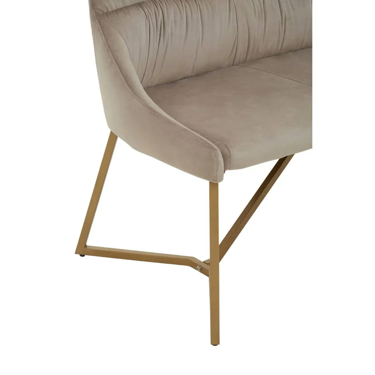 Beige upholstered dining bench with gold metal legs, side angle showing seat detail