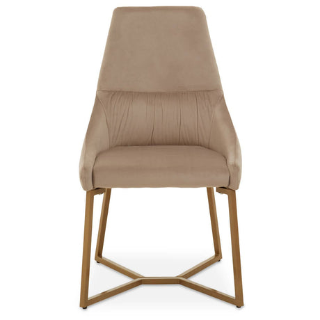 Mink velvet dining chair with a sleek, high back and padded seat, supported by a gold metal frame with a geometric design. The chair features a minimalist style and a soft, neutral color that complements various interior decor