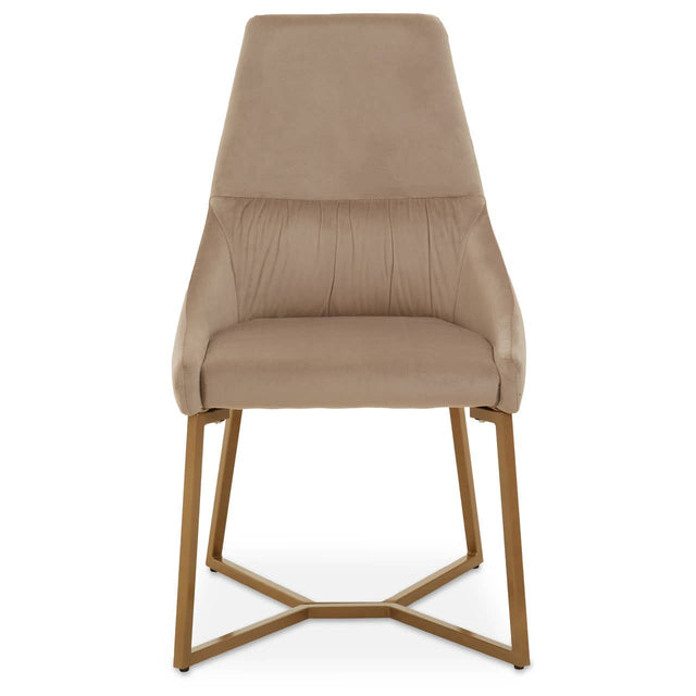 Mink velvet dining chair with a sleek, high back and padded seat, supported by a gold metal frame with a geometric design. The chair features a minimalist style and a soft, neutral color that complements various interior decor