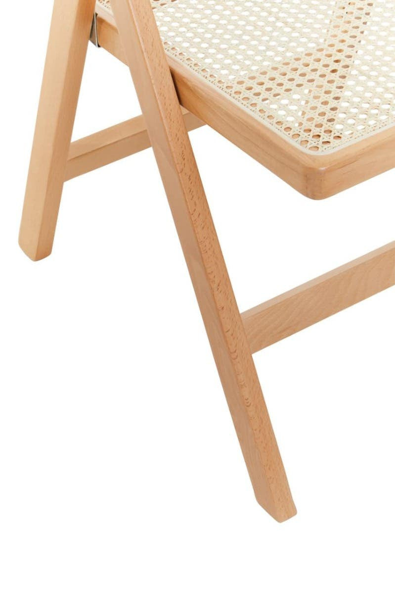 Light beech wood folding chair with a simple, modern design featuring a woven seat and a sturdy frame. The chair is partially visible, showcasing one leg and the seat area