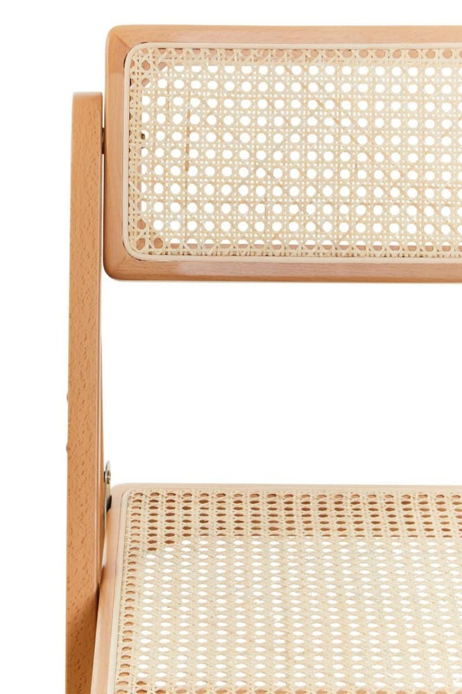 Cebu Beech Wood Frame Folding Chair featuring a natural beech wood frame with a light finish, showcasing a woven cane seat and backrest for a stylish and comfortable design. The chair is in a folded position, highlighting its compact and space-saving feature