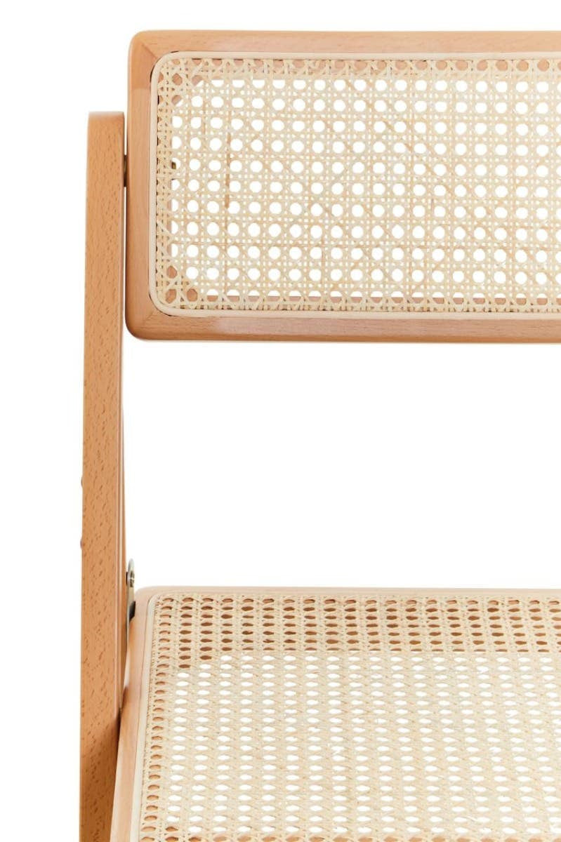 Cebu Beech Wood Frame Folding Chair featuring a natural beech wood frame with a light finish, showcasing a woven cane seat and backrest for a stylish and comfortable design. The chair is in a folded position, highlighting its compact and space-saving feature