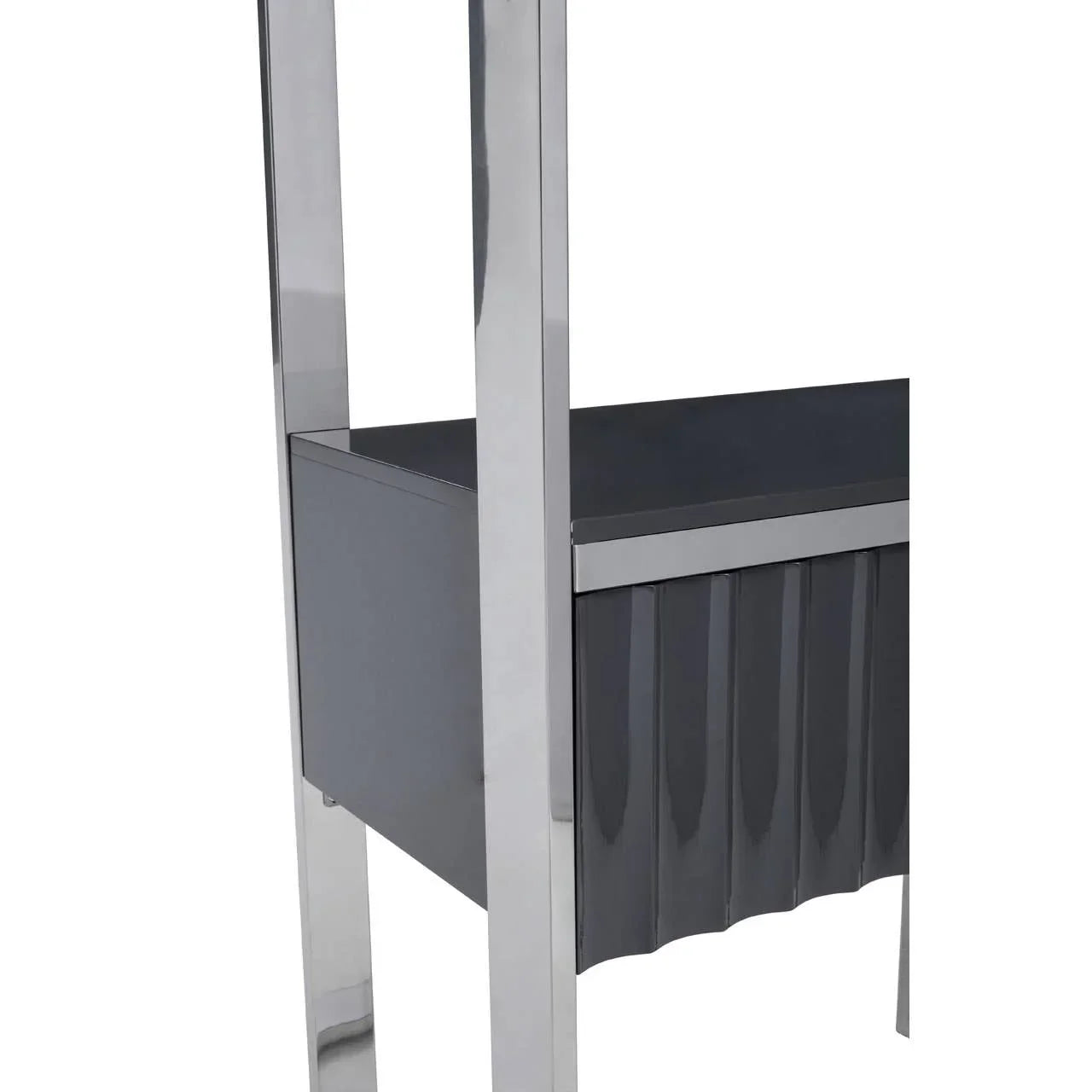 Modern grey side table with chrome metal legs and ribbed drawer front, close up view
