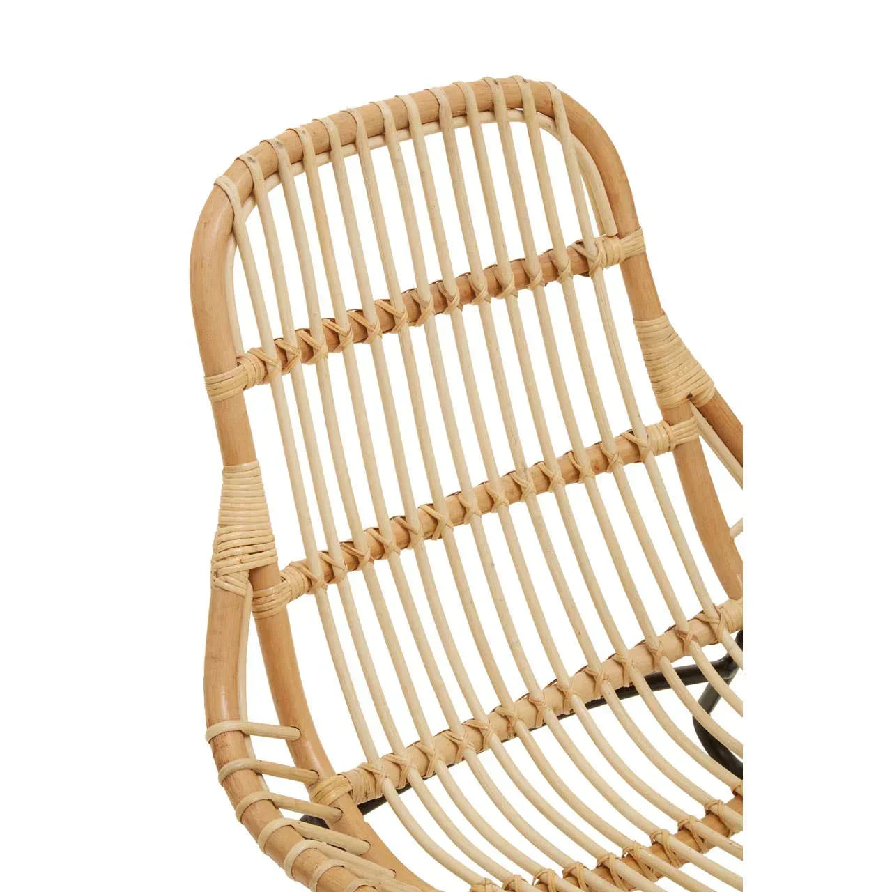 Closeup of rattan chair backrest with natural woven cane design