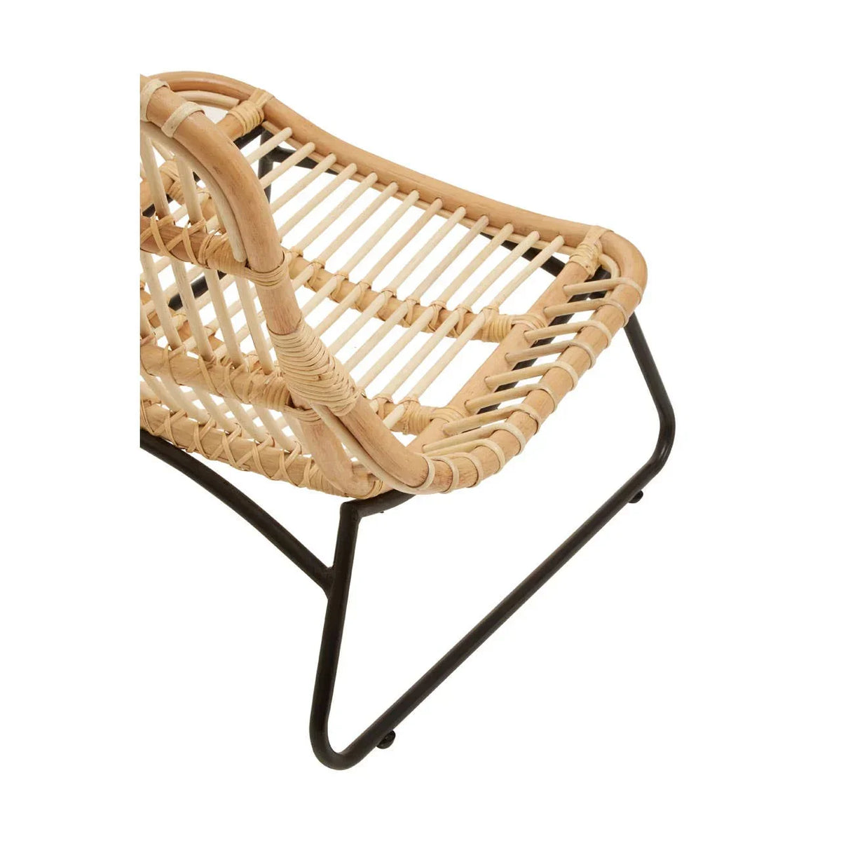 Rattan accent chair with black metal legs and woven seat detail, angled side view