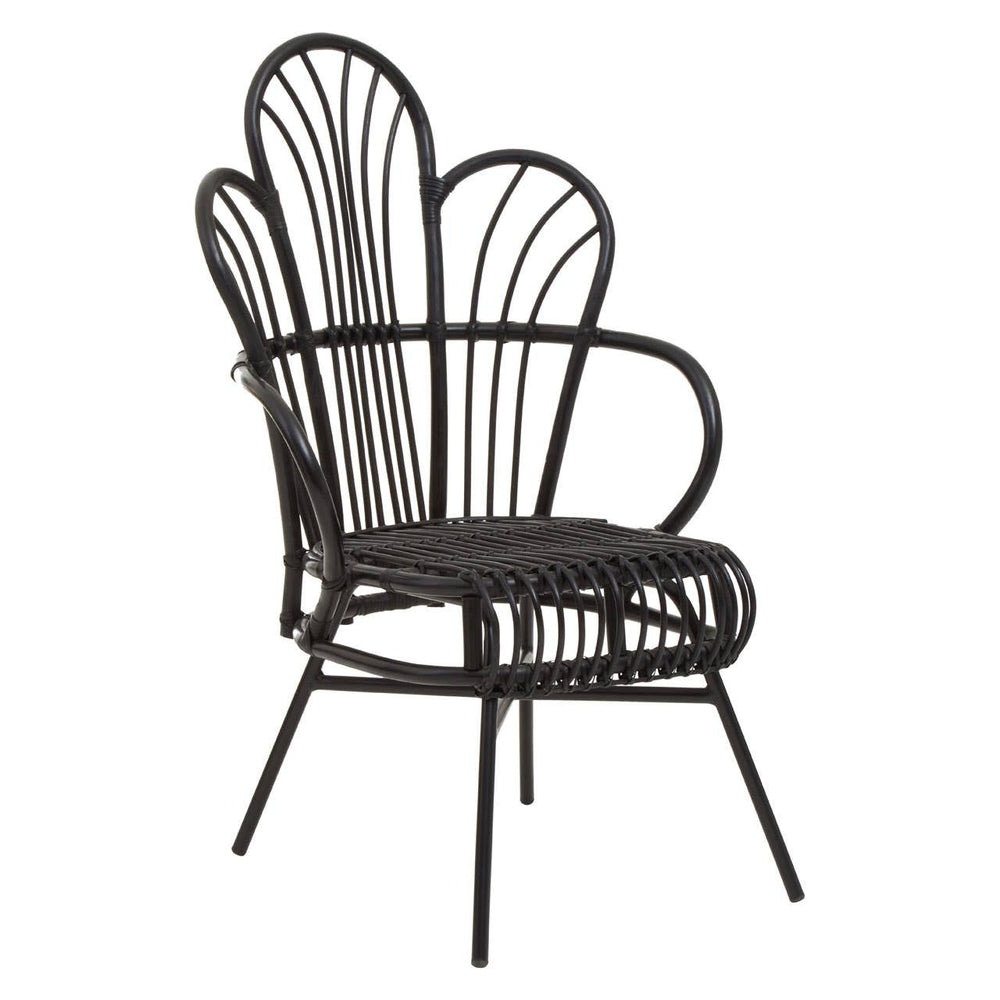 A black metal chair featuring a scalloped back design made of natural rattan, with curved armrests and slender legs, showcasing a modern and stylish aesthetic suitable for home decor