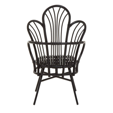 A black metal chair featuring a scalloped back design made from natural rattan, with a round seat and slender legs. The overall structure is elegant and modern, showcasing a combination of materials and a unique silhouette