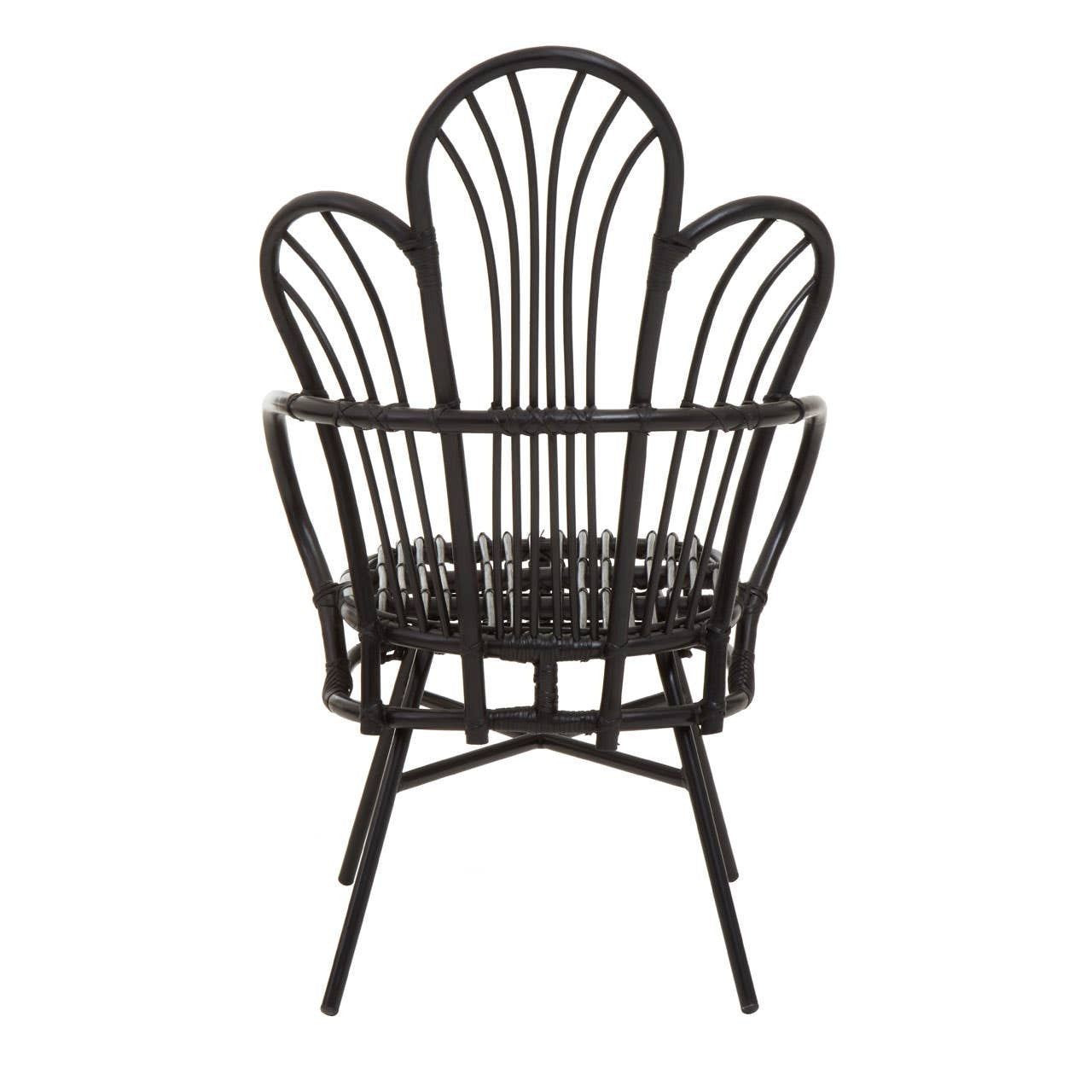 A black metal chair featuring a scalloped back design made from natural rattan, with a round seat and slender legs. The overall structure is elegant and modern, showcasing a combination of materials and a unique silhouette