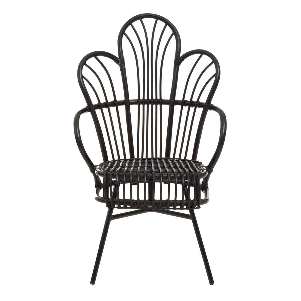A black metal chair featuring a scalloped back design, with natural rattan detailing woven throughout. The chair has a sturdy base with four slender legs, creating a stylish and contemporary look suitable for home decor