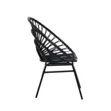 Flared back chair made of black natural rattan, featuring a curved design and slender metal legs, viewed from the side