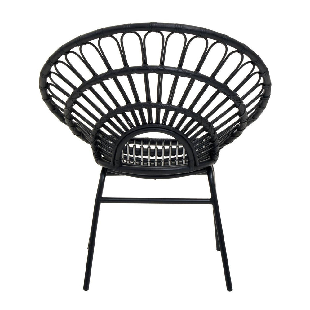 A round, flared back chair made of black natural rattan, featuring a woven design with a sturdy metal frame and four legs. The chair has a spacious seat and an open back, showcasing a modern and stylish look suitable for home decor