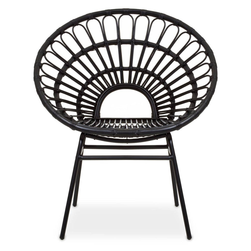 A flared back chair made of black natural rattan, featuring a circular design with a wide, open back and a sturdy metal frame. The chair has four legs and a minimalist aesthetic, suitable for modern home decor