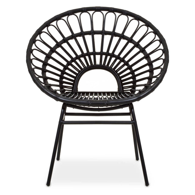 A flared back chair made of black natural rattan, featuring a circular design with a wide, open back and a sturdy metal frame. The chair has four legs and a minimalist aesthetic, suitable for modern home decor