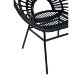 Black rattan flared back chair with a circular seat and open weave design, supported by slender metal legs. The chair features a modern, minimalist aesthetic suitable for various home decor styles
