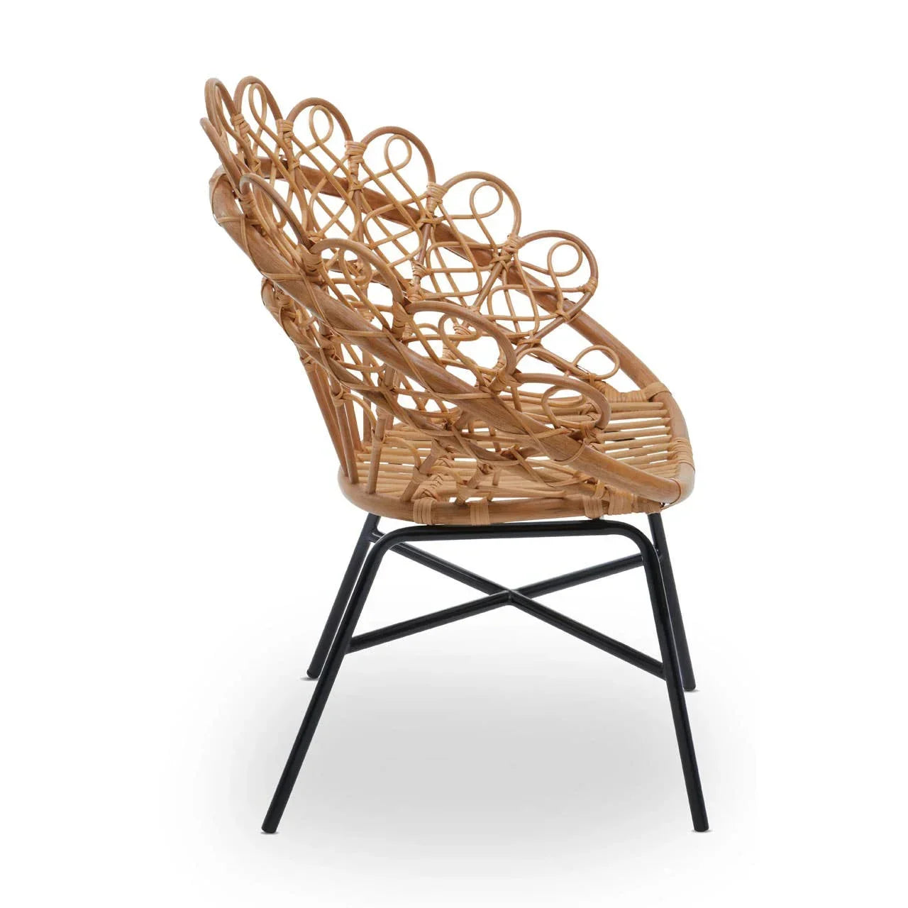Side view rattan accent chair with intricate woven backrest and black metal legs
