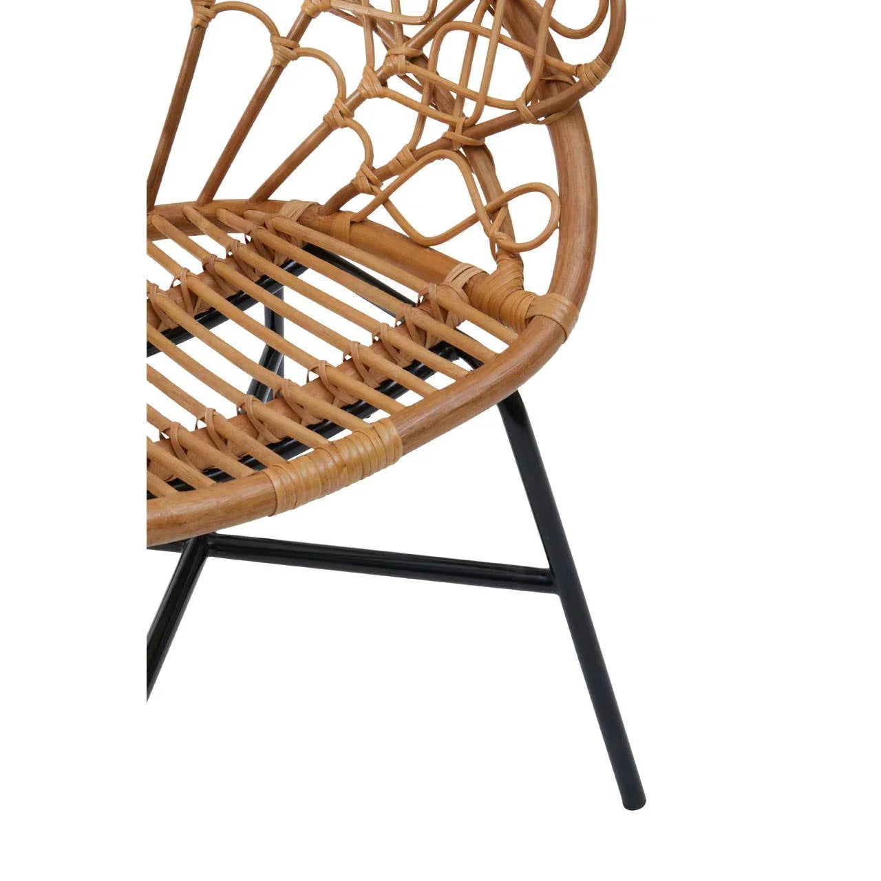 Close-up of rattan chair seat with black metal legs and woven pattern detail
