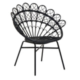 A stylish peacock chair featuring a black natural rattan design with a curved backrest and intricate woven details, supported by slender black metal legs. The chair showcases a fan-shaped silhouette, adding a modern touch to home decor