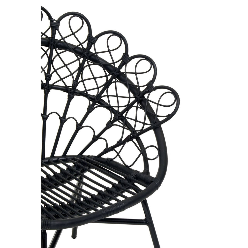 A black natural rattan peacock chair featuring a distinctive fan-shaped backrest with circular patterns, supported by a sturdy frame and a woven seat. The design showcases intricate detailing and a modern aesthetic suitable for home decor