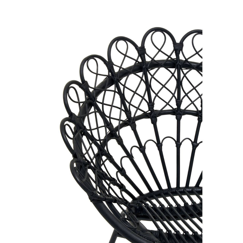 A close-up view of the Java Black Natural Rattan Peacock Chair, showcasing its intricate woven design and curved backrest with a fan-like shape. The chair features a sturdy circular base and elegant detailing in the rattan material, emphasizing its stylish and bohemian aesthetic