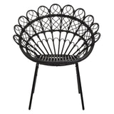 A black rattan peacock chair with a circular, fan-shaped backrest featuring intricate woven patterns, supported by four slender legs. The chair has a natural finish that highlights the rattan texture