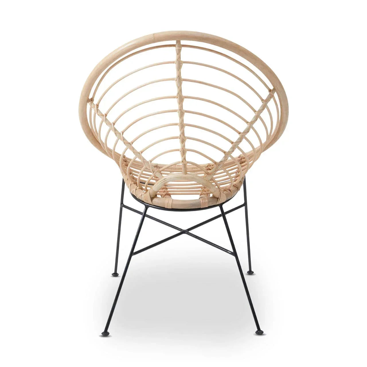 Natural rattan accent chair with round back and black metal legs, rear view