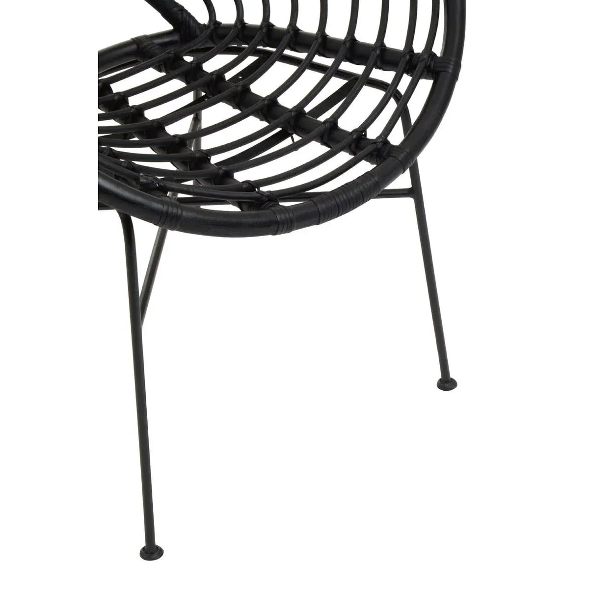 Close view of black rattan chair seat with metal legs and woven detail