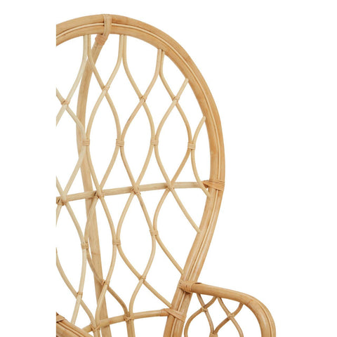Curved chair made of natural rattan featuring a distinctive woven pattern and a light, airy design, showcasing the intricate details of the rattan material
