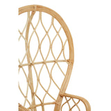 Curved chair made of natural rattan featuring a distinctive woven pattern and a light, airy design, showcasing the intricate details of the rattan material