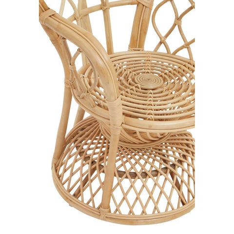 Curved chair made of natural rattan, featuring a woven design with a circular seat and a sturdy base. The chair showcases a light, natural finish and intricate patterns in the rattan weaving