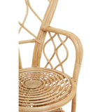 Curved chair made from natural rattan featuring a woven seat and backrest with a decorative lattice design, showcasing a light, airy aesthetic suitable for home decor