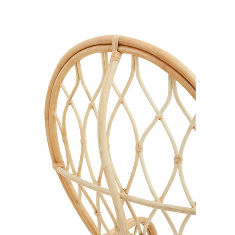 Curved backrest of a Java Natural Rattan Chair showcasing a woven design with natural rattan material, highlighting its organic texture and light color