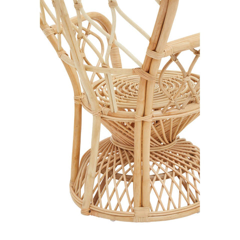 Curved chair made from natural rattan, featuring a woven seat and backrest with a circular base, showcasing intricate patterns and a light, airy design