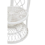 Curved chair featuring a natural rattan design with a grey and white color scheme, showcasing a woven seat and backrest with a circular base. The intricate pattern highlights the craftsmanship of the rattan material