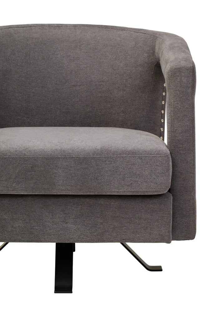 Grey fabric accent chair with metal base and stud detail on side, front view