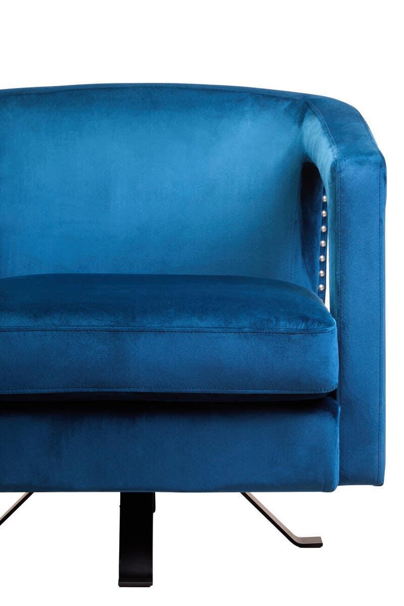 Blue velvet armchair with stud detail and black metal legs, front closeup view