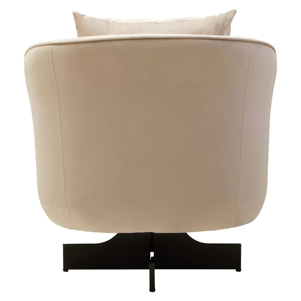 Back view of cream fabric armchair with black metal base and matching cushion