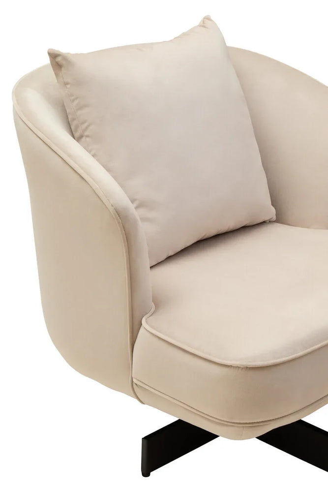 Beige velvet accent chair with curved armrest, plush cushion and black metal legs