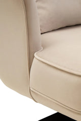 Close-up of beige fabric sofa armrest and cushion detail