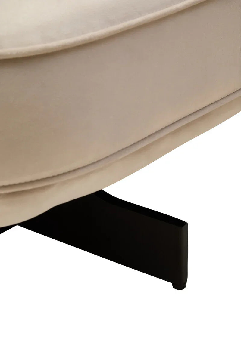 Closeup of beige fabric sofa upholstery with black metal leg base