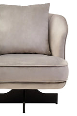 Close-up of grey velvet sofa seat with cushion and modern black base