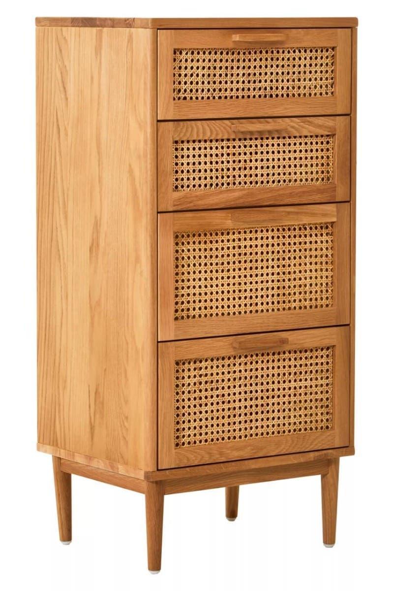 Oak chest of drawers with rattan front panels and tapered legs, shown at a side angle