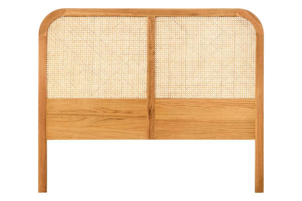 Double bed headboard featuring a curved top design, made from oak wood with a natural finish. The center is woven with rattan, creating a textured look. The headboard has a sturdy base and is designed to fit a standard double bed