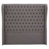 Kingsize headboard in a soft grey fabric featuring a tufted design with a high back and winged sides, providing a stylish and contemporary look for a bedroom