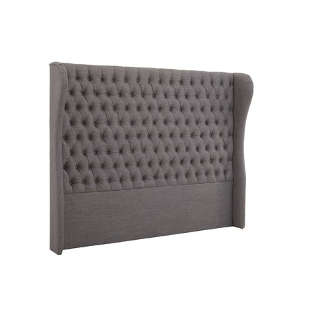 Grey super kingsize headboard with a textured design featuring a series of small, evenly spaced circles. The headboard has a curved edge on one side, providing a modern and stylish look suitable for various bedroom decors