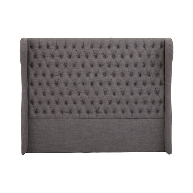 Grey super kingsize headboard featuring a tufted design with a high back and winged sides, providing a modern and elegant look suitable for a bedroom