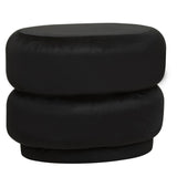 Black velvet oval pouffe with a smooth, rounded design featuring two stacked sections, suitable for use as a footrest or additional seating