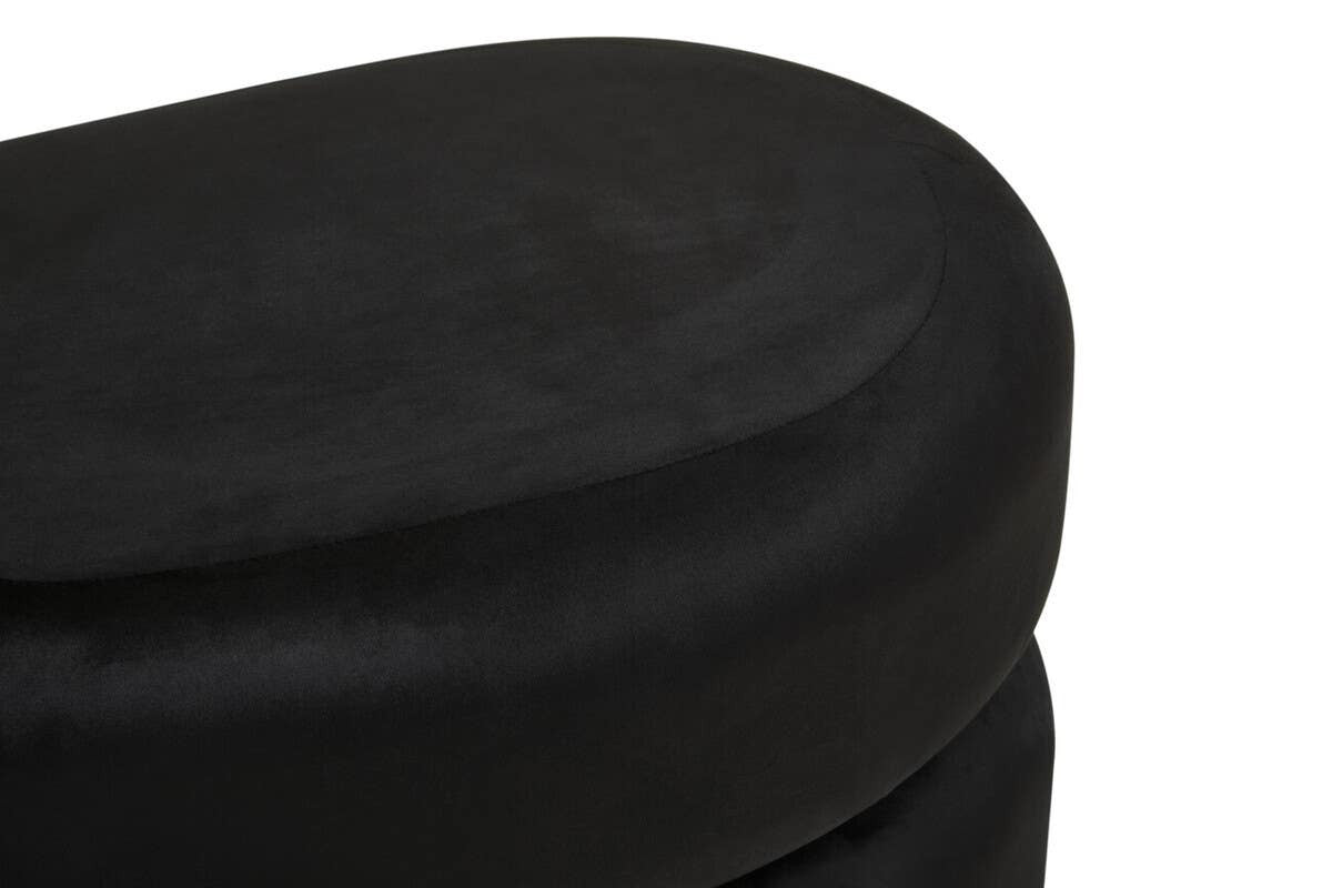 Black velvet oval pouffe with a smooth, rounded top and a soft texture, designed for comfort and style in home decor